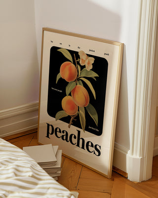 Contemporary peaches art print leaning on white bedroom wall. Framed poster with peach illustration and positive quotes.