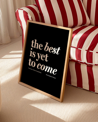 Print reading "the best is yet to come" in black. Affirmation mental health prints with positive quote. Framed typographic motivational quote art print.
