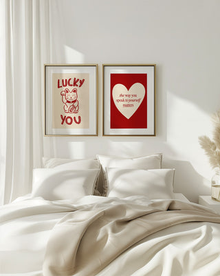 Set of two premium art prints for valentines day gifts. White neutral bedroom with Japanese lucky cat illustration and positive just be yourself art print. Heart illustration, positive and uplifting gallery wall. Cherry red and cream colours