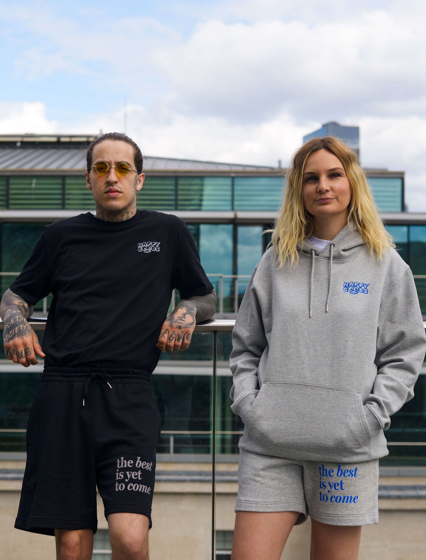 The best is yet to come hoodie. positive messaging mental health hoodie. Male and female models on rooftop wearing positive affirmation clothing