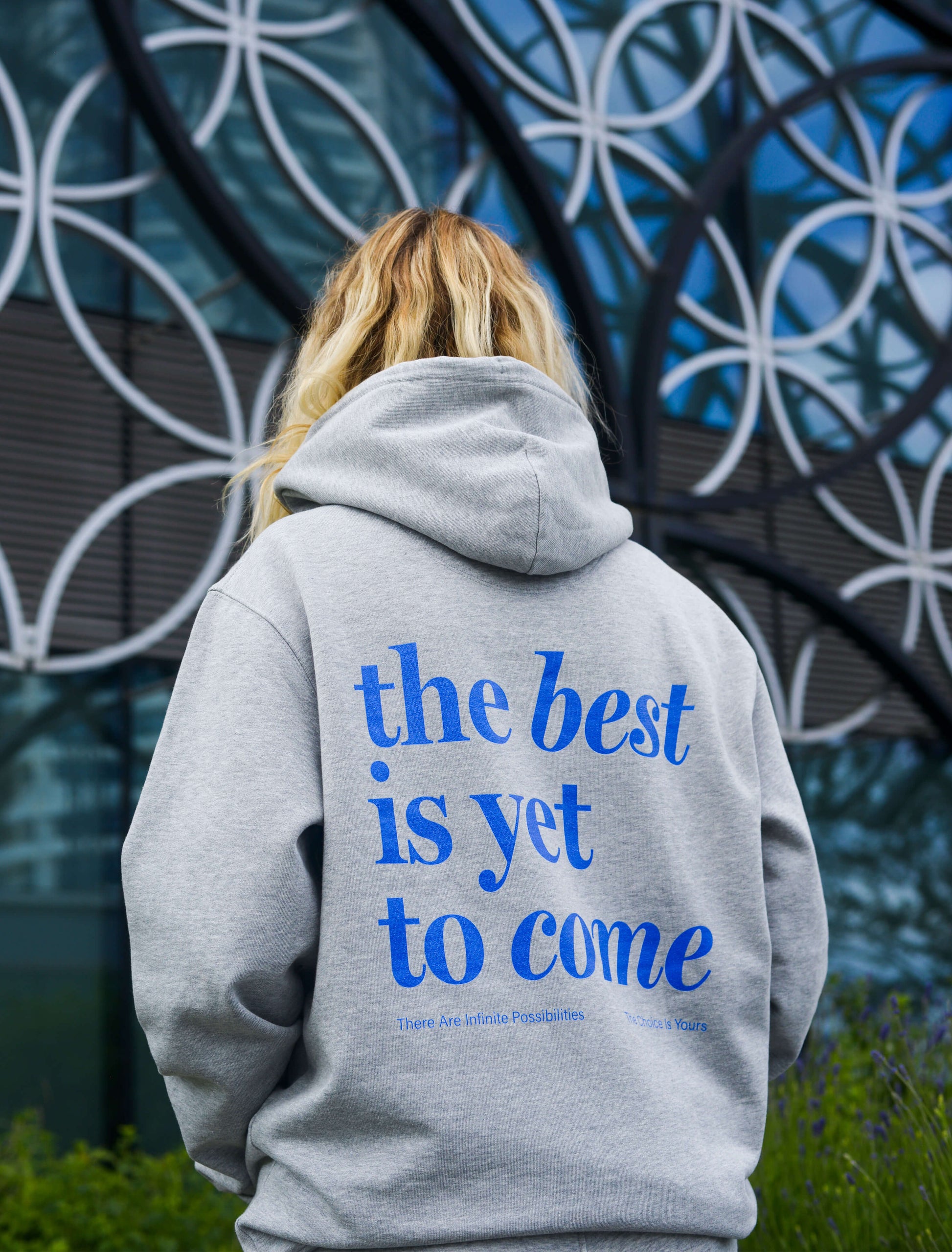 The best is yet to come hoodie. woman wearing unisex positive mental health hoodie