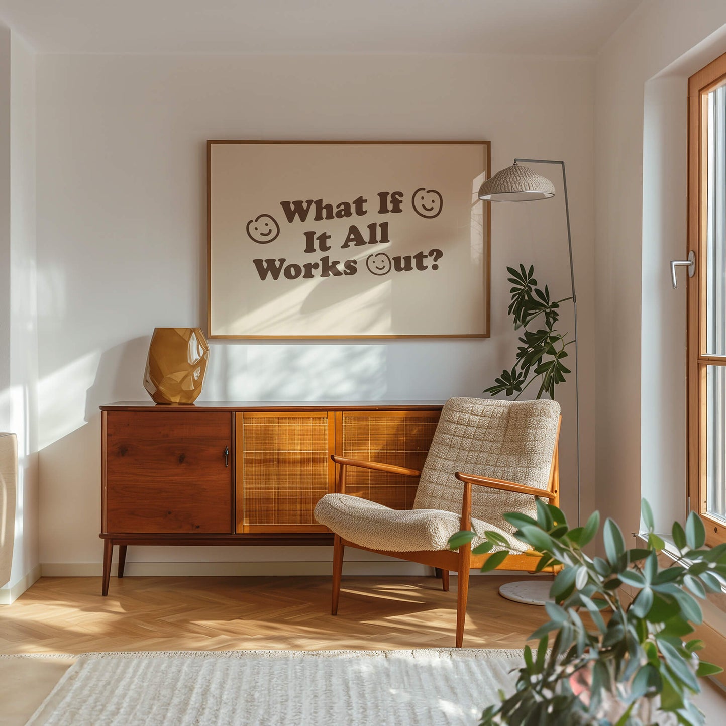 Motivational wall art print that reads &quot;what if it all works out?&quot;. The wall art has modern smiley faces. The large frame is in a vintage style living room. Neutral colours, cream and brown