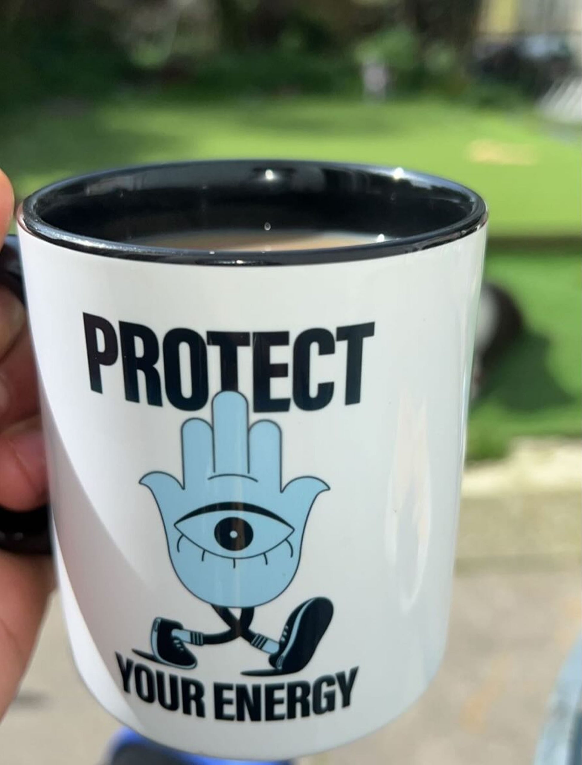 Protect your energy with our Hamsa Hand illustration mug in baby blue