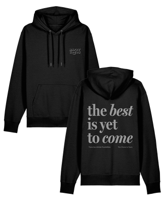 The best is yet to come hoodie in black unisex front and back. Typographic quote and Happy Goods logo