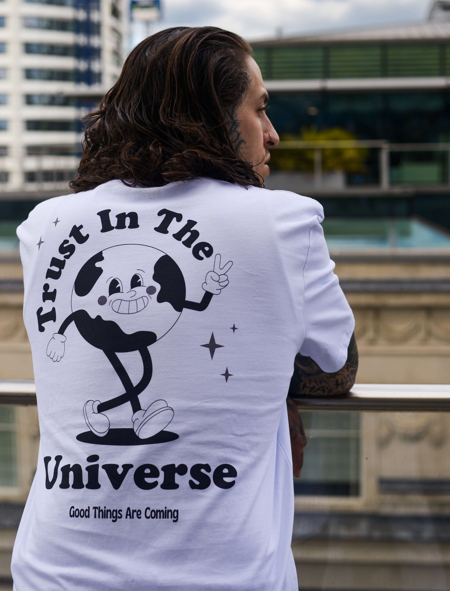 Trust in the universe tee, positive t-shirt, affirmation clothing, streetwear, unisex clothing. Man with tattoos 
